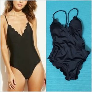 Black one-piece swimsuit scallop details